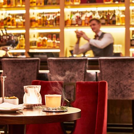 Grand Hotel Kempinski Riga Exterior photo The bar at the Connaught