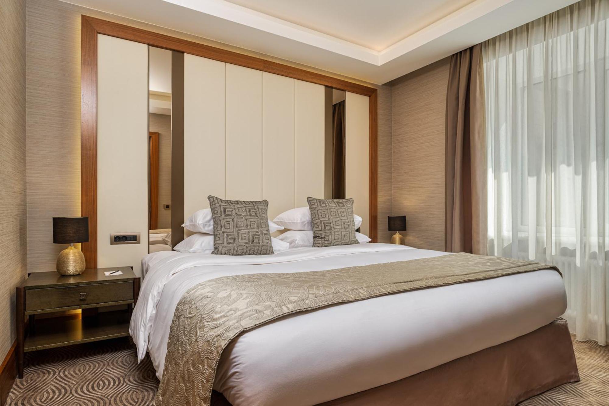 Grand Hotel Kempinski Riga Room photo A bedroom at the hotel